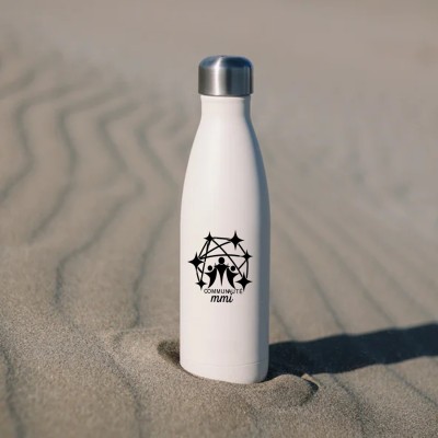 Gourde posée sur du sable
